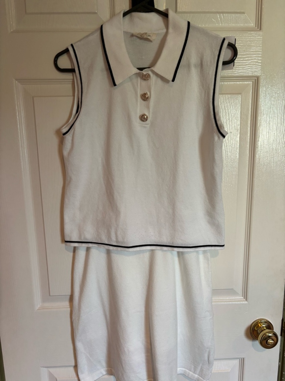 Sleeveless White Polo Skirt Set with Black Trim